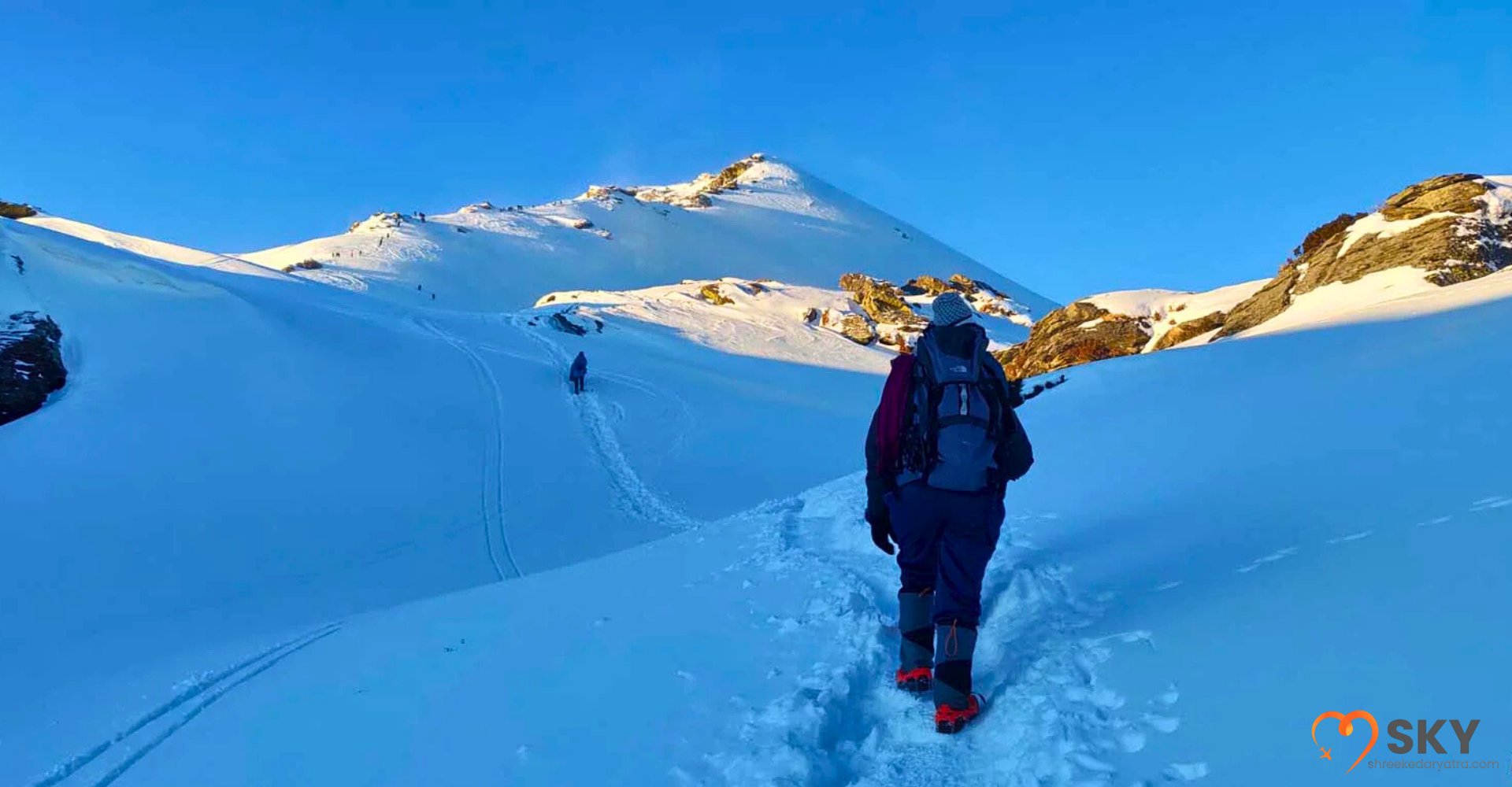 Happy beginner trekkers on a gradual ascent during the Kedarkantha Trek, ideal for first-timers